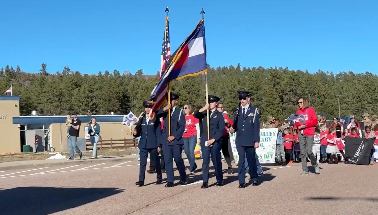 The Air Academy High School JROTC Color Guard leads our Veterans Day parade.